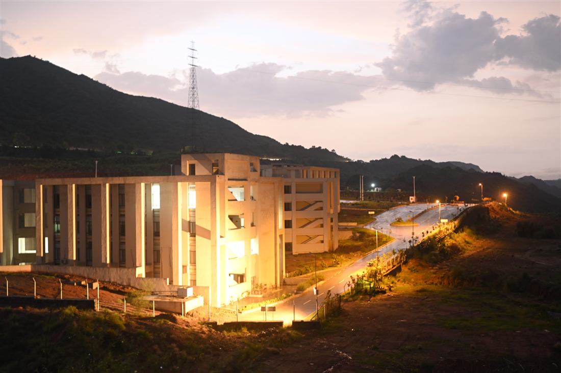 Al-Qadir University campus at dusk